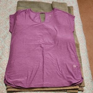 Top, womens, workout/exercise size Medium, would fit Large. Made big. Purple.